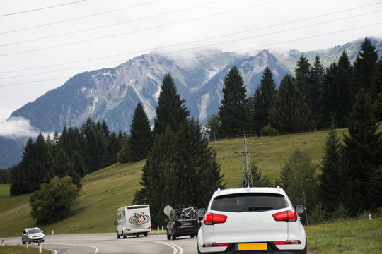 Travelers people driving car on the road passed Bichlbach city go to Pfunds village in Tirol region, Austrian