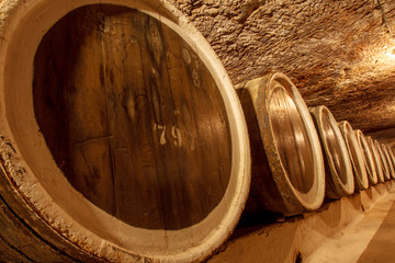 barrels with the wine in the old basement.