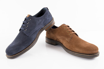 Male brown and blue leather shoe on white background, isolated product, comfortable footwear.