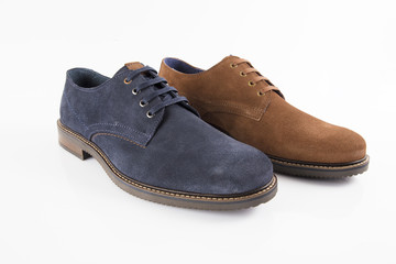 Male brown and blue leather shoe on white background, isolated product, comfortable footwear.