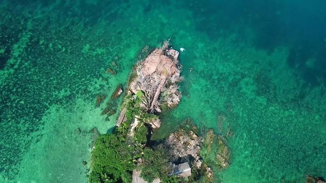 Drone flying above koh Raham area, Haad Son sand beach and Secret beach at koh Phangan island,Thailand