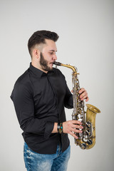 Fototapeta premium Saxophone Player Saxophonist with Sax
