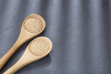 Amaranth seeds in wooden spoons - Amaranthus