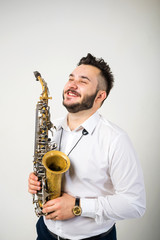 Obraz na płótnie Canvas Saxophone Player Saxophonist with Sax