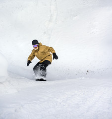Snowboarder moving down