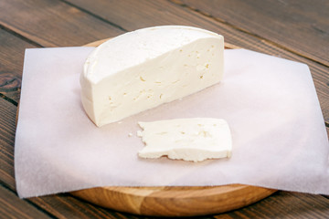 Homemade cheese from the farm. The concept is healthy food, restaurant, cafe, vegetarianism.