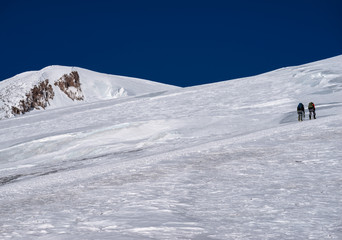 Fototapeta na wymiar Climbing of alpinist in Caucasus mountains
