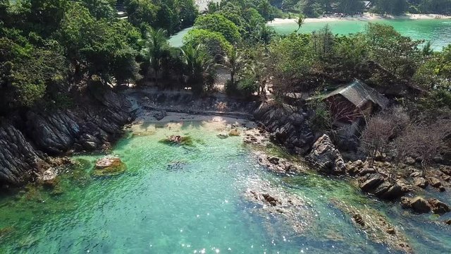 Drone flying above koh Raham area, Haad Son sand beach and Secret beach at koh Phangan island,Thailand