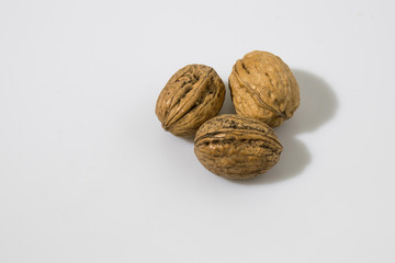 Walnuts composition in a white background