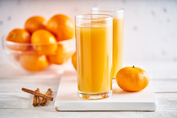 Mandarin juice in beautiful glasses.