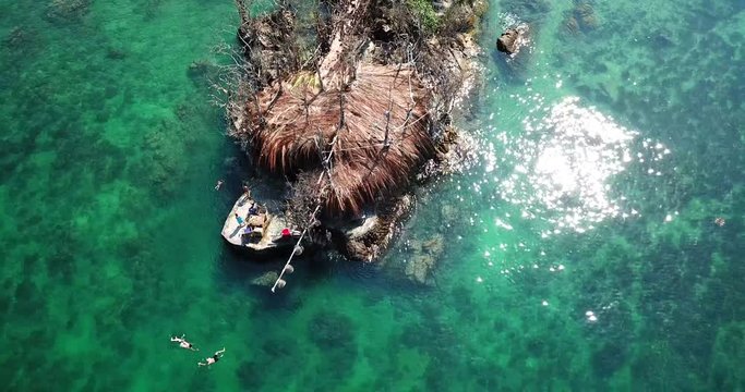 Drone flying above koh Raham area, Haad Son sand beach and Secret beach at koh Phangan island,Thailand