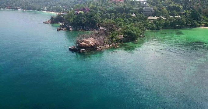 Drone flying above koh Raham area, Haad Son sand beach and Secret beach at koh Phangan island,Thailand