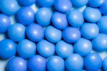 Close up a colorful candies of chocolates with blue colors