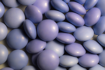 Close up a colorful candies of chocolates with purple colors
