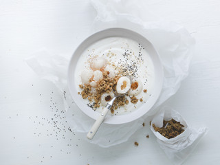 white yoghurt bowl with litchi and chia seeds