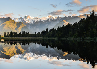 Mt Cook is reflect to the water at Lake matheson in new zealand southland