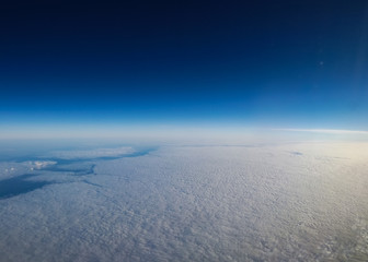 View above the clouds in the sky