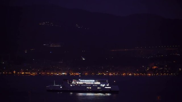 16222_View_of_the_ferry_cruising_on_the_sea_at_night_in_Italy.mov