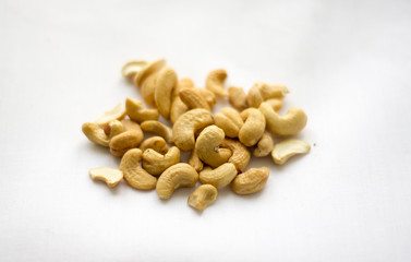Oganic cashews on the white background