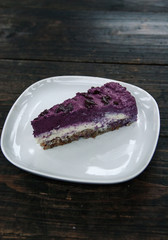 Piece of blueberry vegan cake the white plate