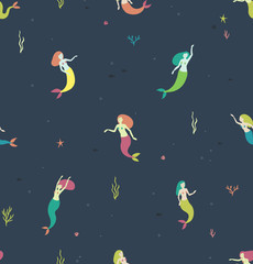 Seamless pattern with mermaids on a dark blue background