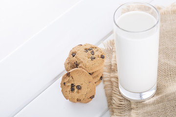 Closeup of Milk and Chocolate biscuit on table