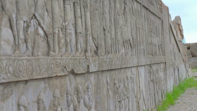 relief images on the walls in Tachara palace in Persepolis