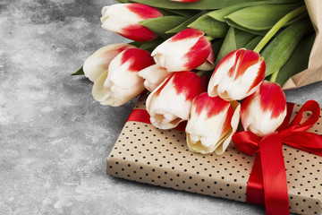 Bouquet of white pink tulips on a gray background. Copy space
