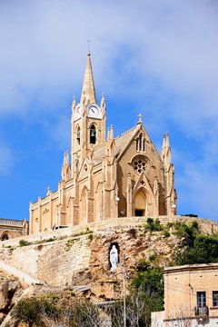 View of Our Lady of Lourdes church on the hillside, Mgarr, Gozo.