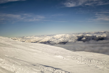 peaks of mountains above the clouds