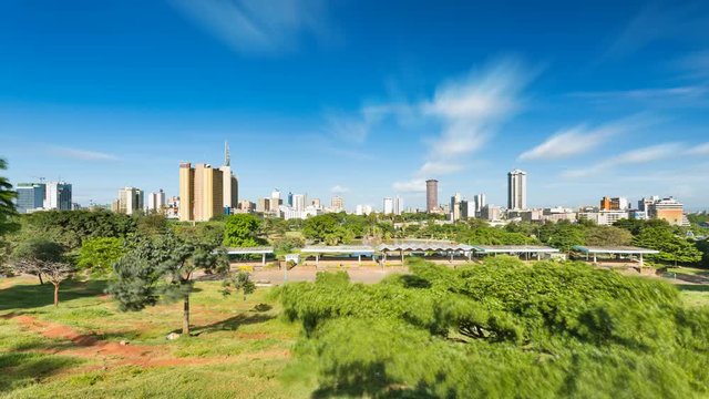 Long exposure timelapse sequence of the skyline of Nairobi, Kenya with Uhuru Park in the foreground in 4K