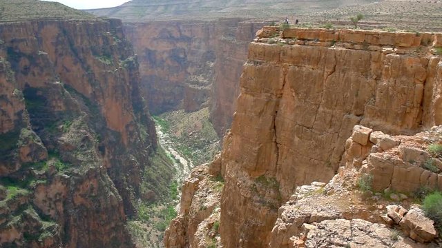 panorama of a beautiful canyon at the bottom of which flows a river