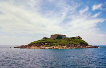 Fototapeta na wymiar Small uninhabited island of Mamula with old fortress. Montenegro