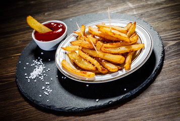 Chips on wooden background