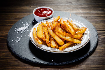 Chips on wooden background