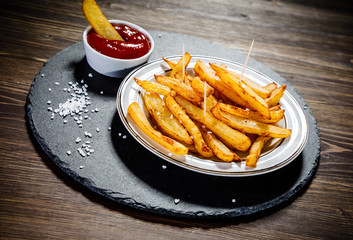 Chips on wooden background