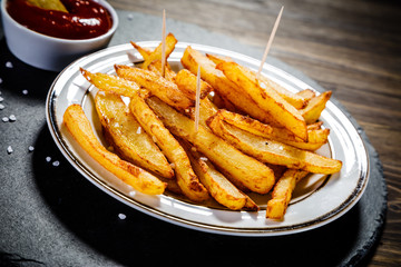 Chips on wooden background
