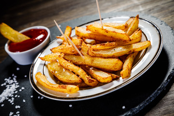 Chips on wooden background