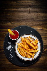 Chips on wooden background