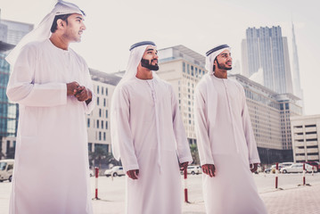 Arabian businessmen meeting outdoors