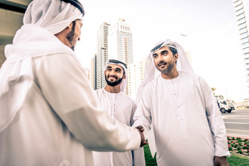 Arabian businessmen meeting outdoors