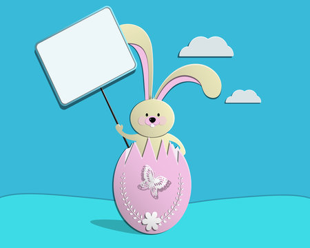Easter Bunny sitting in a broken egg with a sign with copy space