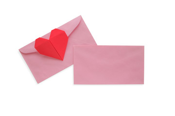 Pink envelope with red heart paper origami isolated on white background