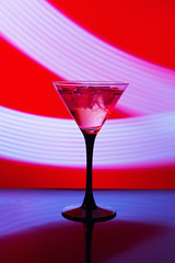 Martini glass and abstract light