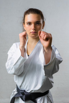 Young Woman Practicing Karate Martial Art