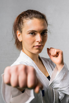 Young Woman Practicing Karate Martial Art
