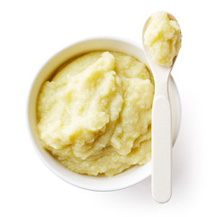 Cauliflower and zucchini baby puree isolated on white