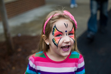 Face Painted Little Girl at a Festival