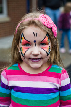 Face Painted Little Girl at a Festival