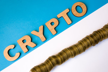 Crypto and cryptocurrency coin photo concept top view. Word crypto composed of volumetric 3D...